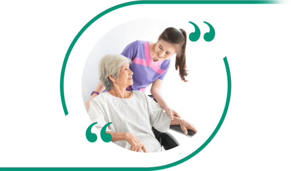 Caregiver assisting elderly woman