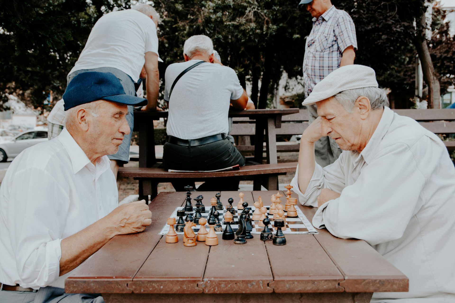 Elderly men playing chess